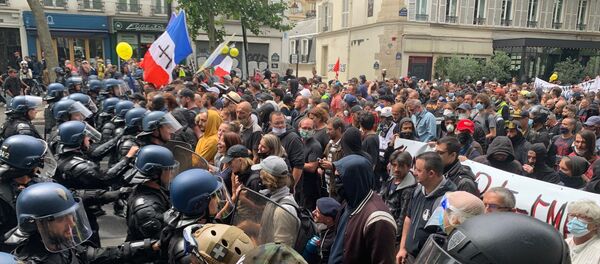 Des manifestations de soignants et de Gilets jaunes se tiennent à Paris le jour de la Fête nationale du 14 juillet - Sputnik Afrique