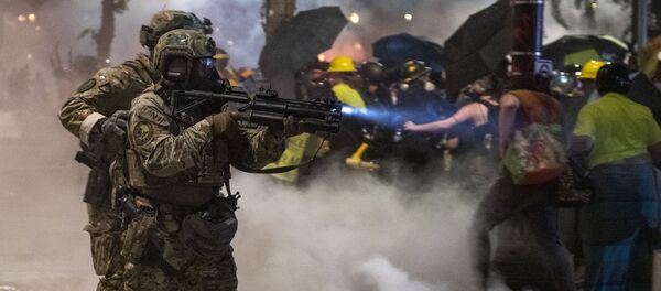 Affrontements entre policiers et manifestants à Portland (archive photo) - Sputnik Afrique