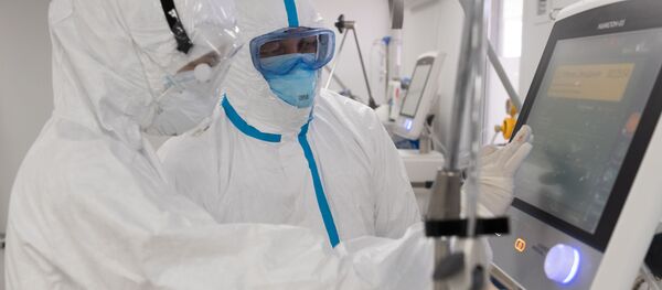 Des médecins traitant des patients atteints du Covid-19 (photo d'archives) - Sputnik Afrique