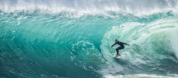 Un surfeur, image d'illustration - Sputnik Afrique