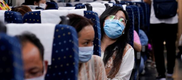 Das passagers dans un train à grande vitesse en Chine - Sputnik Afrique