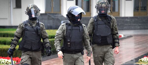 Des membres d'une unité spéciale de police à Minsk (archive photo) - Sputnik Afrique