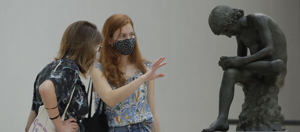 Personnes en masques aux musées du Capitole à Rome Personnes en masques aux musées du Capitole à Rome - Sputnik Afrique