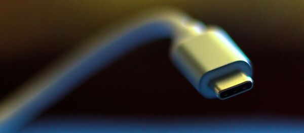 Un chargeur - Sputnik Afrique