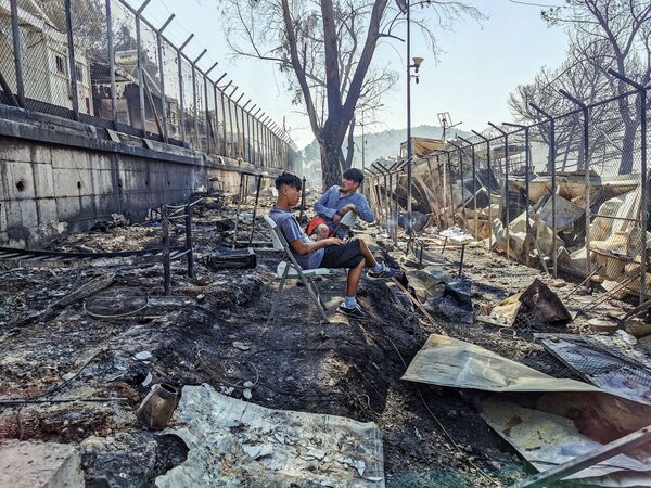 En Grèce, le plus grand camp de migrants d’Europe détruit pas le feu

 - Sputnik Afrique