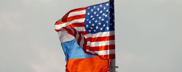Les drapeaux russe et américain (photo d'archives) Les drapeaux russe et américain (photo d'archives) - Sputnik Afrique