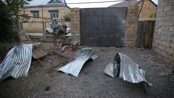 Une maison endommagée, selon les habitants, par un bombardement au Haut-Karabakh, le 28 septembre 2020 - Sputnik Afrique