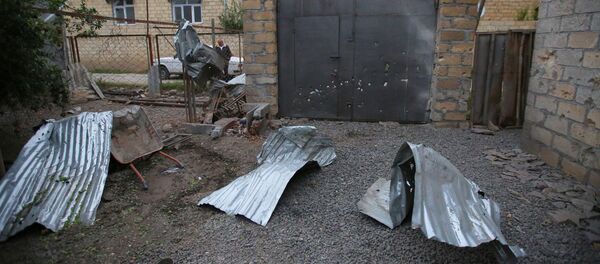 Une maison endommagée, selon les habitants, par un bombardement au Haut-Karabakh, le 28 septembre 2020 - Sputnik Afrique