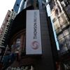 The new logo of Thomson Reuters is seen on their Times Square  - Sputnik Afrique