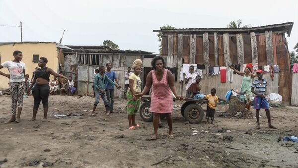 Des habitants du quartier de Souza Nétimé, à Lomé, Togo - Sputnik Afrique