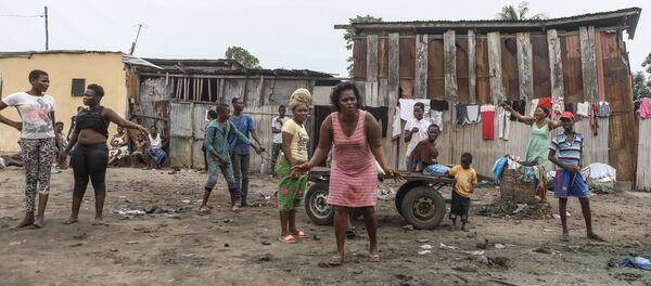 Des habitants du quartier de Souza Nétimé, à Lomé, Togo - Sputnik Afrique