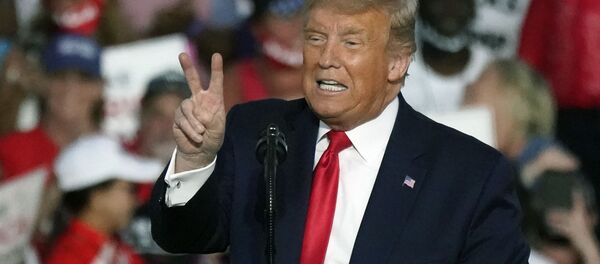 President Donald Trump speaks at a campaign rally at the Orlando Sanford International Airport Monday, Oct. 12, 2020, in Sanford, Fla. - Sputnik Afrique