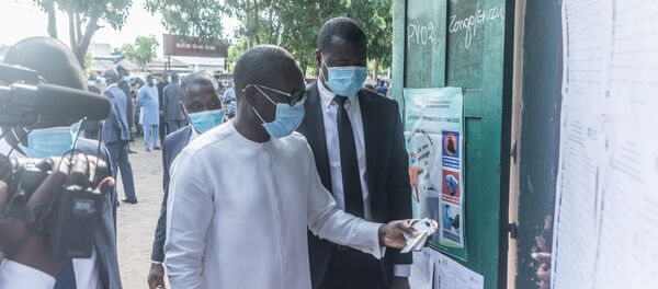Le Président du Bénin Patrice Talon arrive à son bureau de vote pour les élections municipales béninoises - Sputnik Afrique
