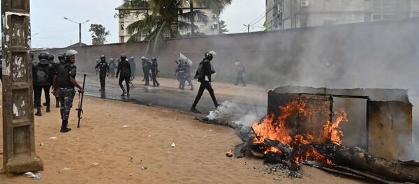 Intervention de la police anti-émeute lors d'une manifestation à Abidjan - Sputnik Afrique