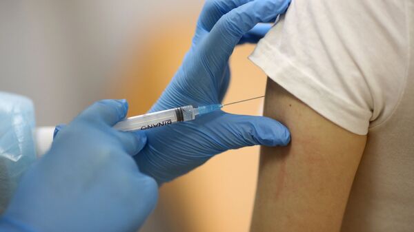Vaccination d'un patient avec Spoutnik V en Russie (archive photo) - Sputnik Afrique