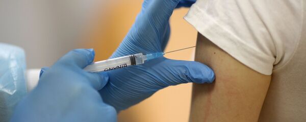 Vaccination d'un patient avec Spoutnik V en Russie (archive photo) - Sputnik Afrique