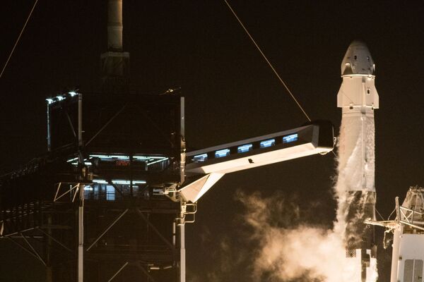 Lancement de la fusée Falcon 9 avec le vaisseau Crew Dragon

 - Sputnik Afrique