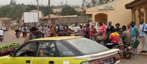 À Yaoundé, difficile de trouver des citoyens masqués - Sputnik Afrique