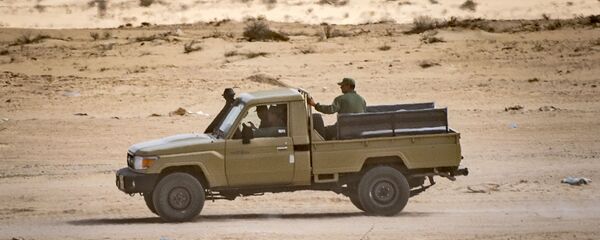 Un véhicule des forces armées marocaines au passage d'El-Guerguerat, entre le Maroc et la Mauritanie - Sputnik Afrique