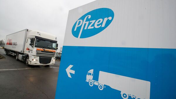 FILE PHOTO: A refrigerated truck leaves the Pfizer plant in Puurs - Sputnik Afrique