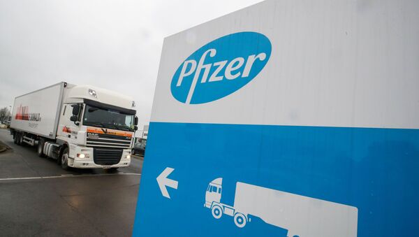 FILE PHOTO: A refrigerated truck leaves the Pfizer plant in Puurs - Sputnik Afrique