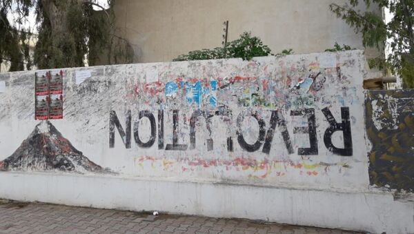 Graffiti sur le boulevard Mohamed Bouazizi, au centre-ville de Sidi Bouzid.  - Sputnik Afrique