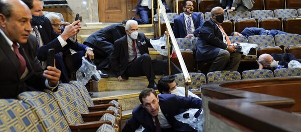 Le Congrès des États-Unis après que des protestataires y ont fait irruption le 6 janvier 2021 - Sputnik Afrique