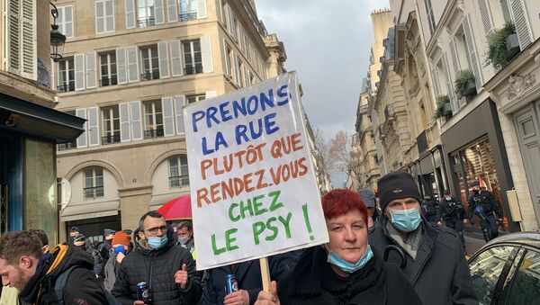 Des manifestants contre les licenciements se rassemblent ce samedi à Paris près de l’Assemblée nationale, 23 janvier 2021 - Sputnik Afrique