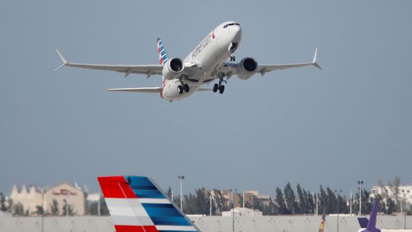 American Airlines flight 718, the first U.S. Boeing 737 MAX commercial flight since regulators lifted a 20-month grounding in November, takes off from Miami, Florida, U.S. December 29, 2020 - Sputnik Afrique
