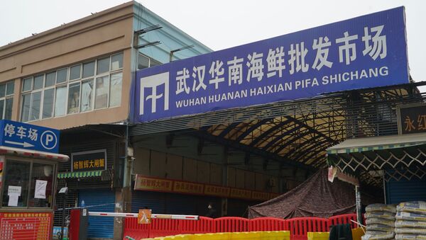 The Wuhan Huanan Wholesale Seafood Market, where a number of people related to the market fell ill with a virus, sits closed in Wuhan, China, Tuesday, Jan. 21, 2020. - Sputnik Afrique