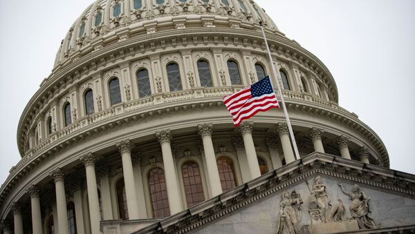 The American flag flies at half staff at the U.S. Capitol Building on the fifth day of the impeachment trial of former U.S. President Donald Trump, on charges of inciting the deadly attack on the U.S. Capitol, in Washington, U.S., February 13, 2021. - Sputnik Afrique