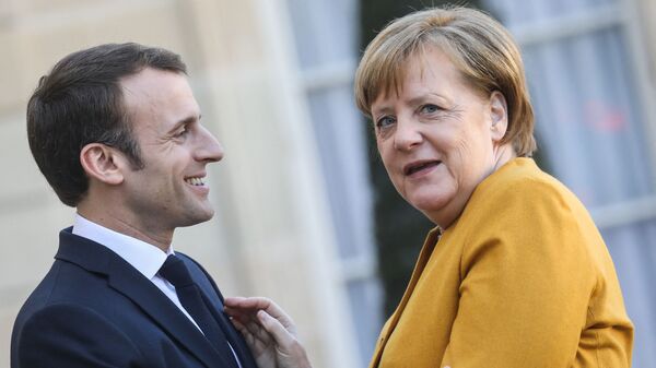 Emmanuel Macron et Angela Merkel, photo d'archives - Sputnik Afrique