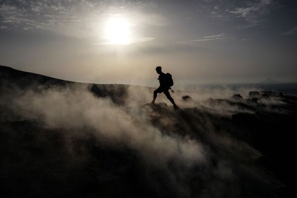 Photos explosives et émotions fortes: à quoi sont prêts les touristes pour photographier une éruption volcanique

 - Sputnik Afrique