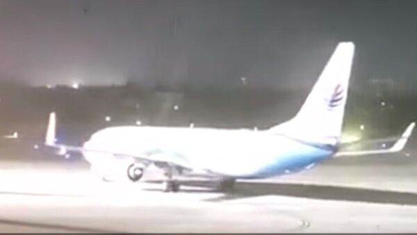 Un orage fait tournoyer un avion posé sur un aéroport chinois - Sputnik Afrique