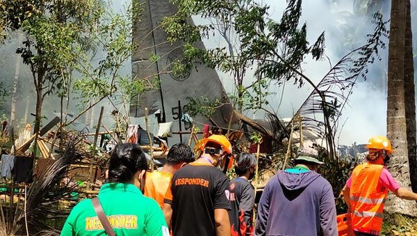 Les lieux du crash d'un avion militaire aux Philippines, le 4 juillet 2021 - Sputnik Afrique