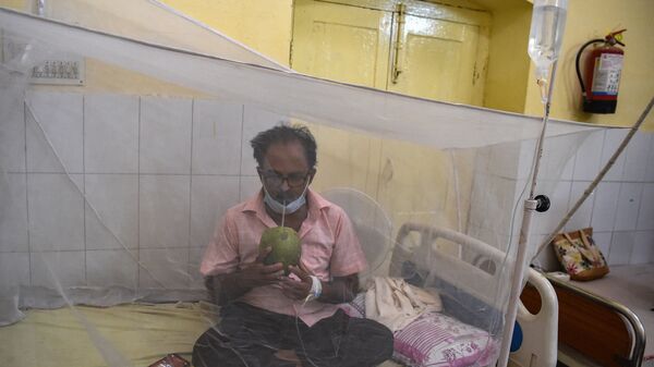 Un patient attent de dengue - Sputnik Afrique