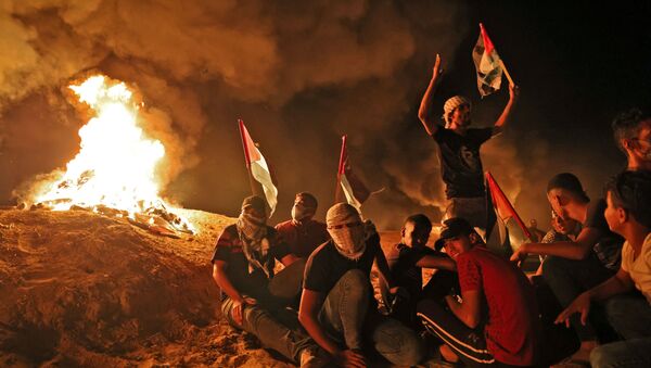 Palestine: manifestations nocturnes près de la frontière avec Israël
 - Sputnik Afrique