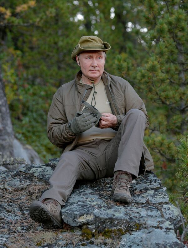 Vladimir Poutine lors de ses traditionnelles courtes vacances en Sibérie après un déplacement dans le Primorié et la région de l&#x27;Amour, en septembre 2021. - Sputnik Afrique