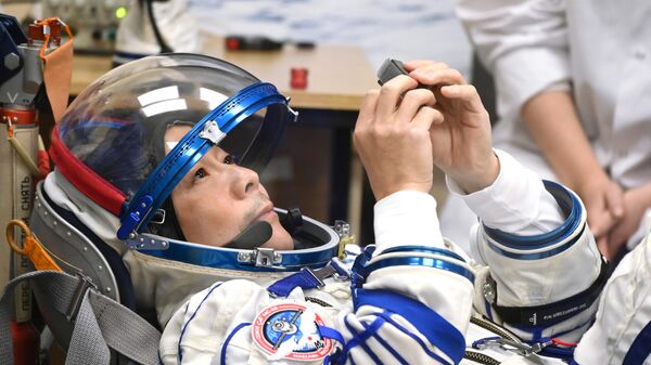 Le touriste de l'espace japonais Yusaku Maezawa se prépare à son vol spatial, le 8 décembre 2021  - Sputnik Afrique