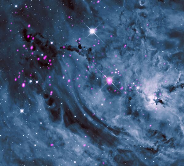 Jeunes étoiles dans la nébuleuse de la Lagune. L’image a été prise par l’observatoire spatial de rayons X Chandra de la NASA. - Sputnik Afrique