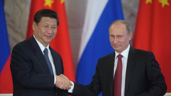 Xi Jinping et Vladimir Poutine - Sputnik Afrique