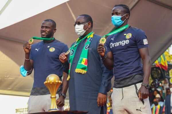 Les Lions du Sénégal reçu par le Président Macky Sall le 8 février 2022 au siège de la Présidence© Cheikh Diallo - Sputnik Afrique
