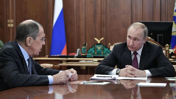 Sergueï Lavrov et Vladimir Poutine (archive photo) - Sputnik Afrique