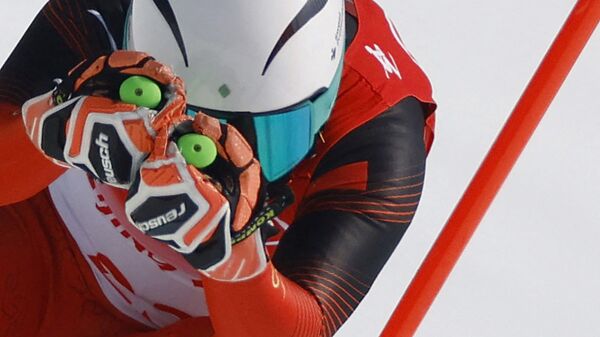 Китайский горнолыжник Янмин Чжан на XXIV зимних Олимпийских играх в Пекине - Sputnik Afrique