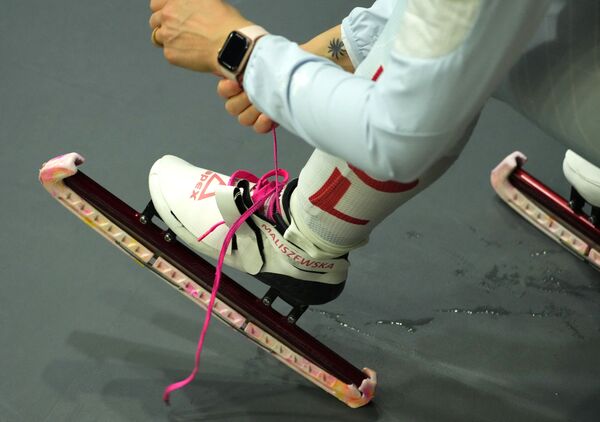 La patineuse de vitesse polonaise sur piste courte Natalia Maliszewska se prépare à s’entraîner au Palais omnisports de la capitale de Pékin. - Sputnik Afrique