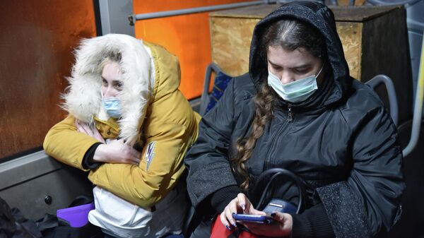 Évacuation en cours d'habitants de la république autoproclamée de Donetsk vers la Russie, 18 février 2022 - Sputnik Afrique