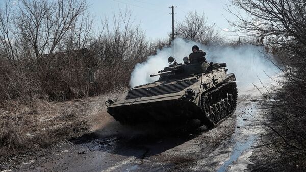 Des militaires ukrainiens dans la région de Donetsk, le 19 février 2022 - Sputnik Afrique
