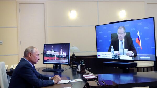 Président russe Vladimir Poutine et ministre russe des Affaires étrangères Sergueï Lavrov - Sputnik Afrique