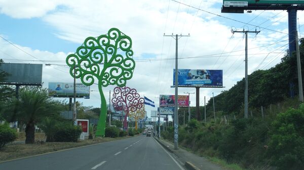 Une rue décorée à Managua, Nicaragua - Sputnik Afrique