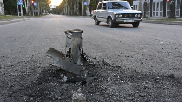Un obus non explosé à Donetsk (image d'illustration) - Sputnik Afrique